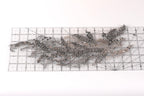 a collection of sequin pieces and a ruler on a white background.