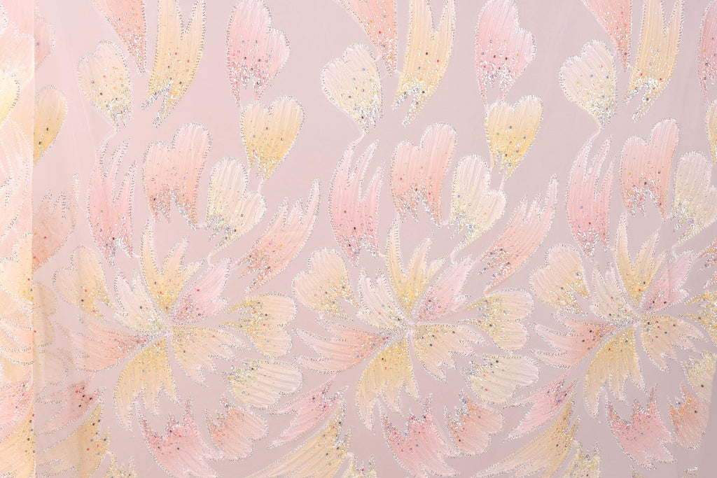 a repeating pattern of pink and yellow flowers with sparkles on a light pink background.