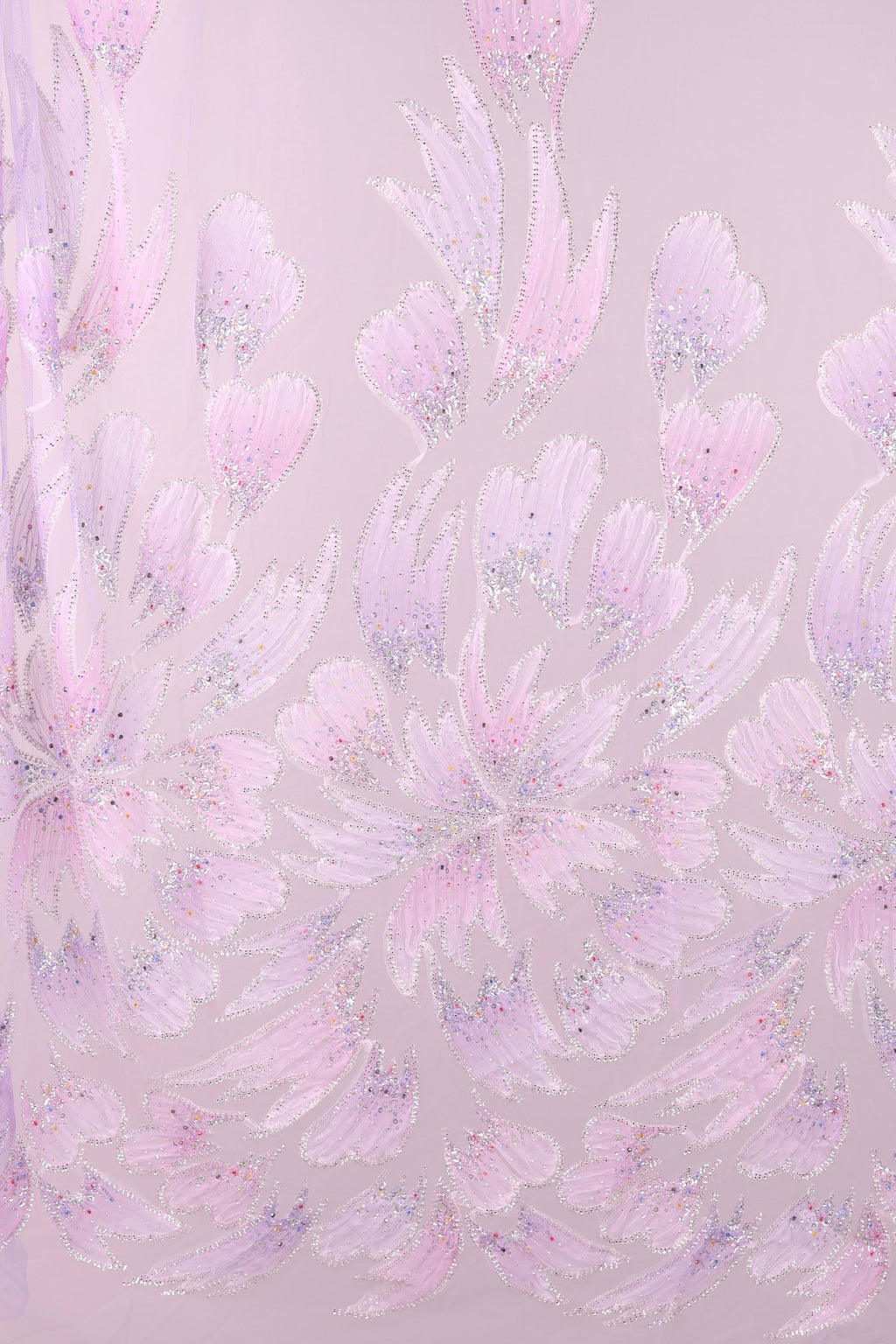 a pattern of pink and purple flowers with glittering details, creating a visually striking and intricate design.