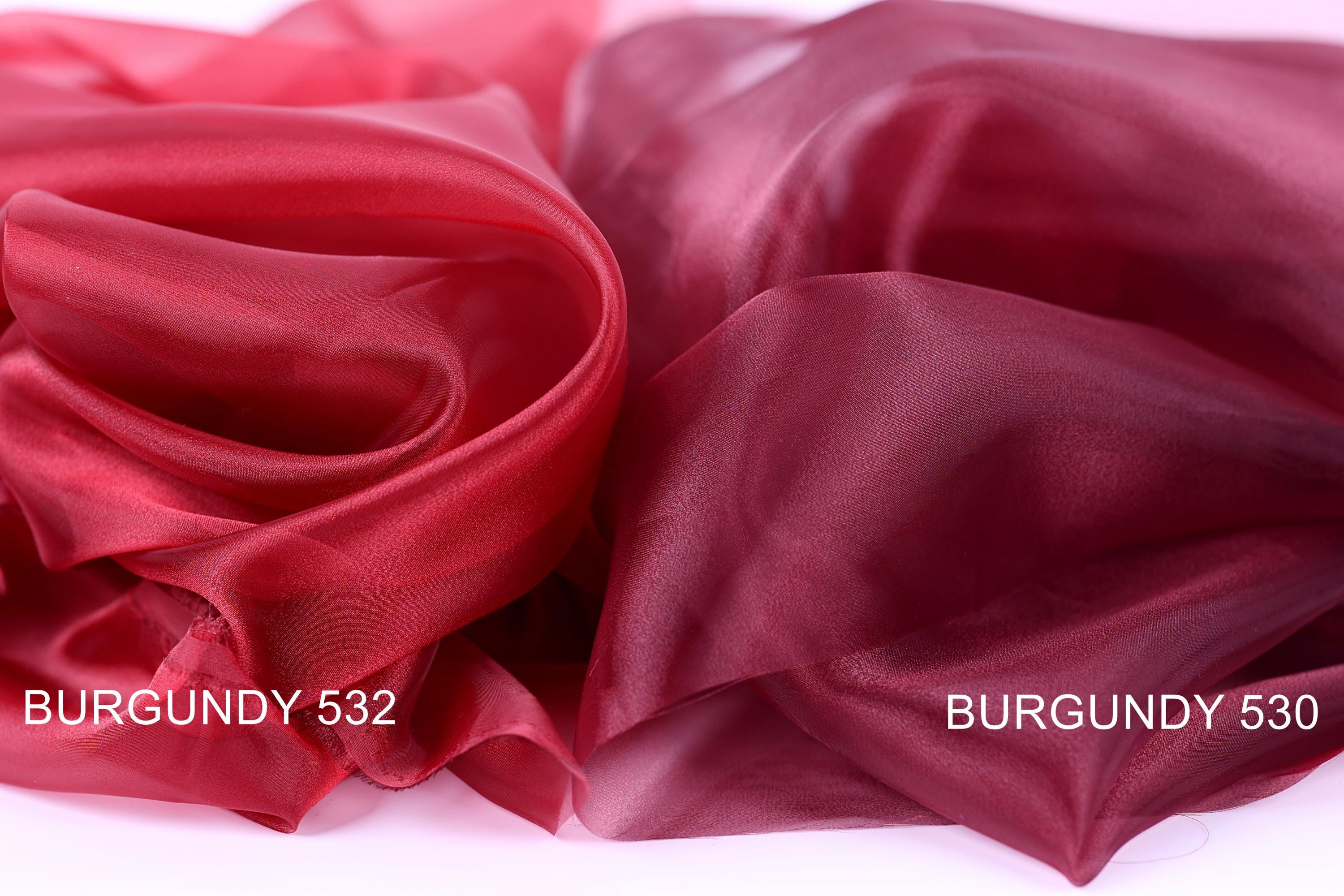 two close-up views of a red fabric, with the text "BURGundy 532" and "BURGundy 530" indicating the fabric's color and brand.