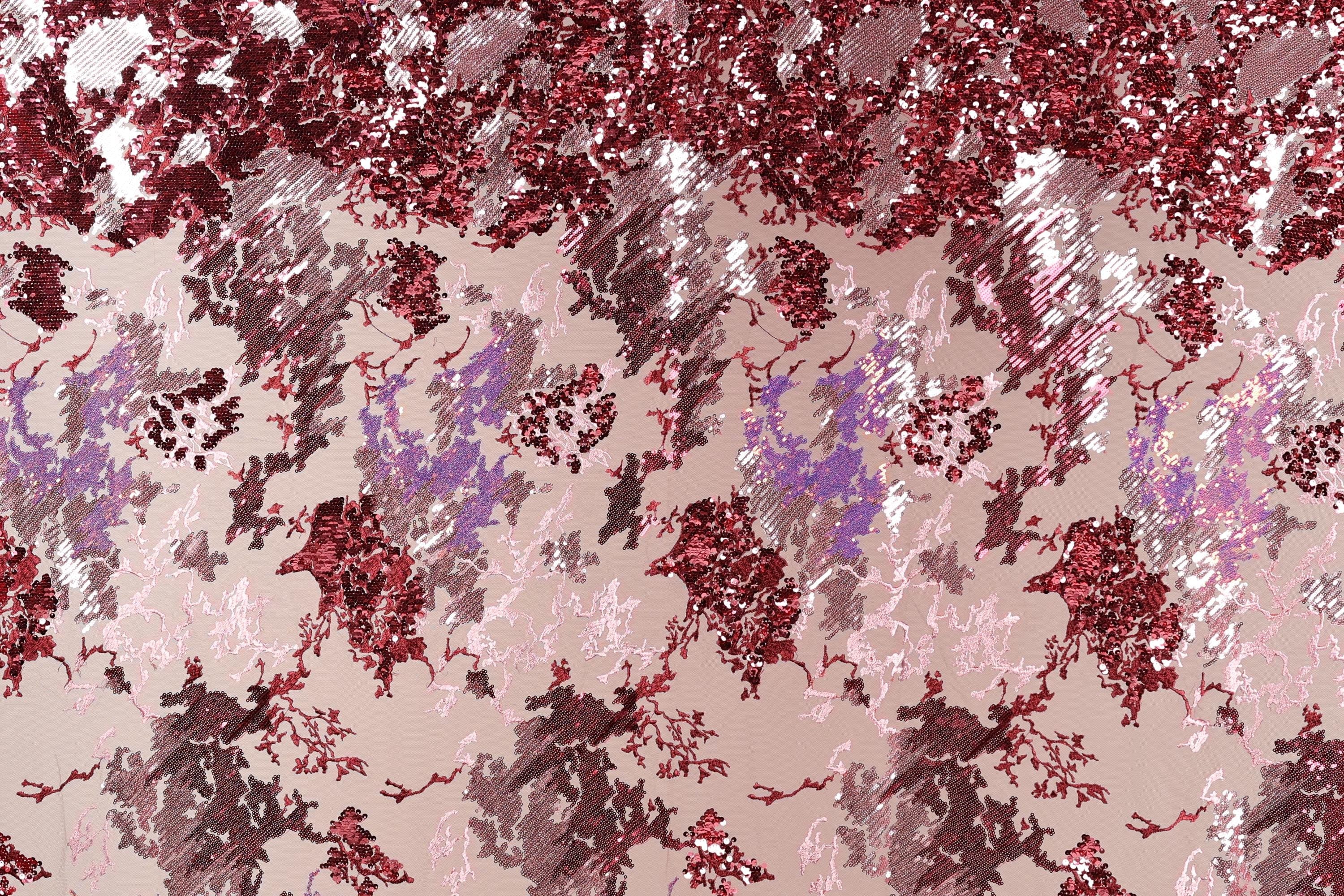 The image is a collage of various images, including a pink and red background with a pattern of red and pink glitter or sequins, as well as other abstract shapes and patterns in shades of pink and red.