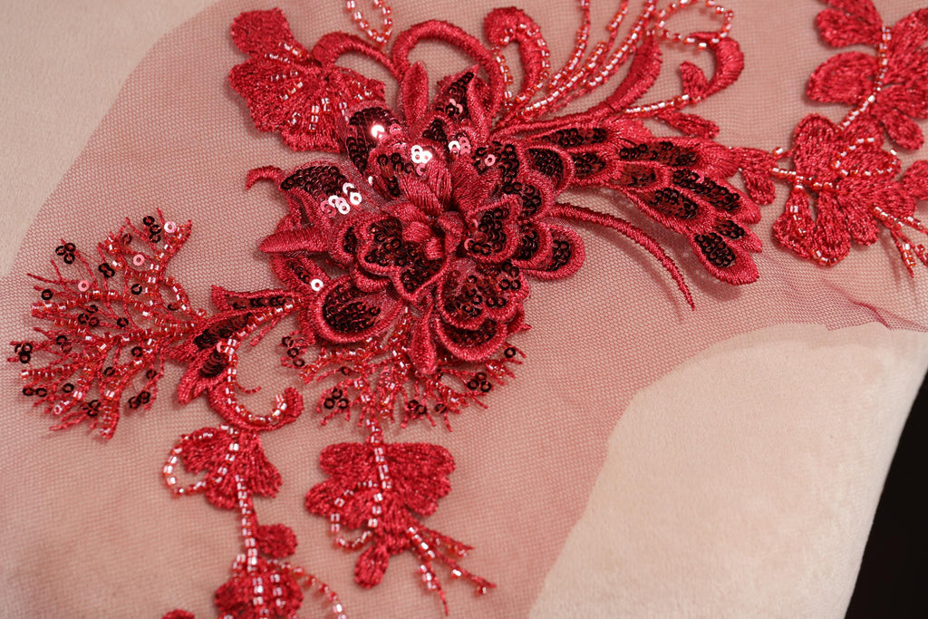 a close up of a piece of cloth with sequins on it
