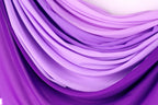 a close-up view of a fabric with a gradient of purple and pink colors, creating a visually appealing and textured appearance.