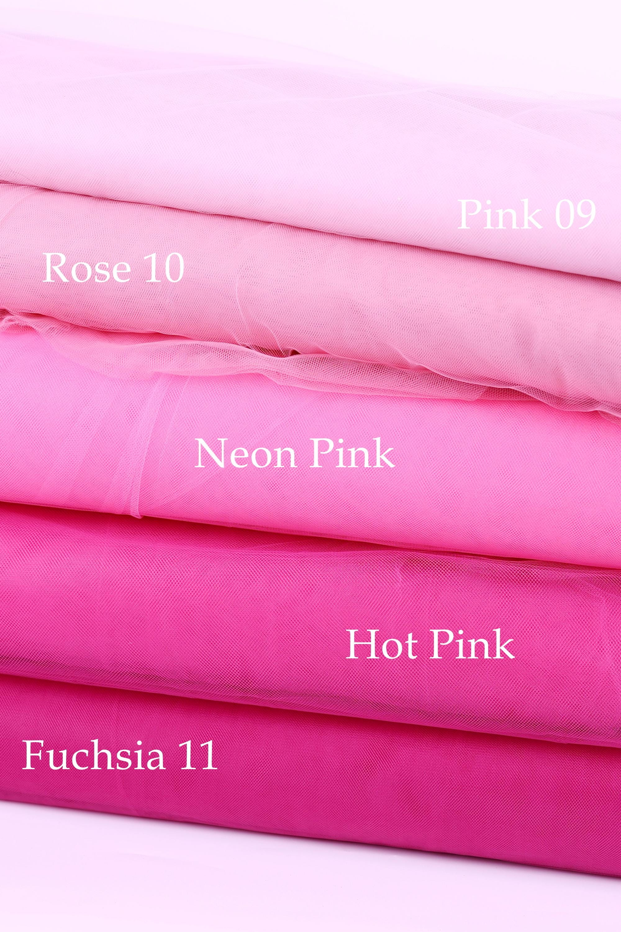A stack of five fabric swatches in various shades of pink, including Rose 10, Neon Pink, Hot Pink, and Fuchsia 11.