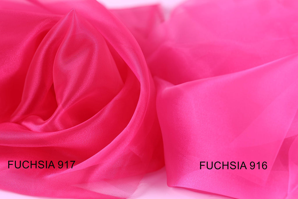 two close-up views of a soft, shiny pink fabric, with the text "FUCHSIA 917" and "FUCHSIA 916" visible on the fabric.
