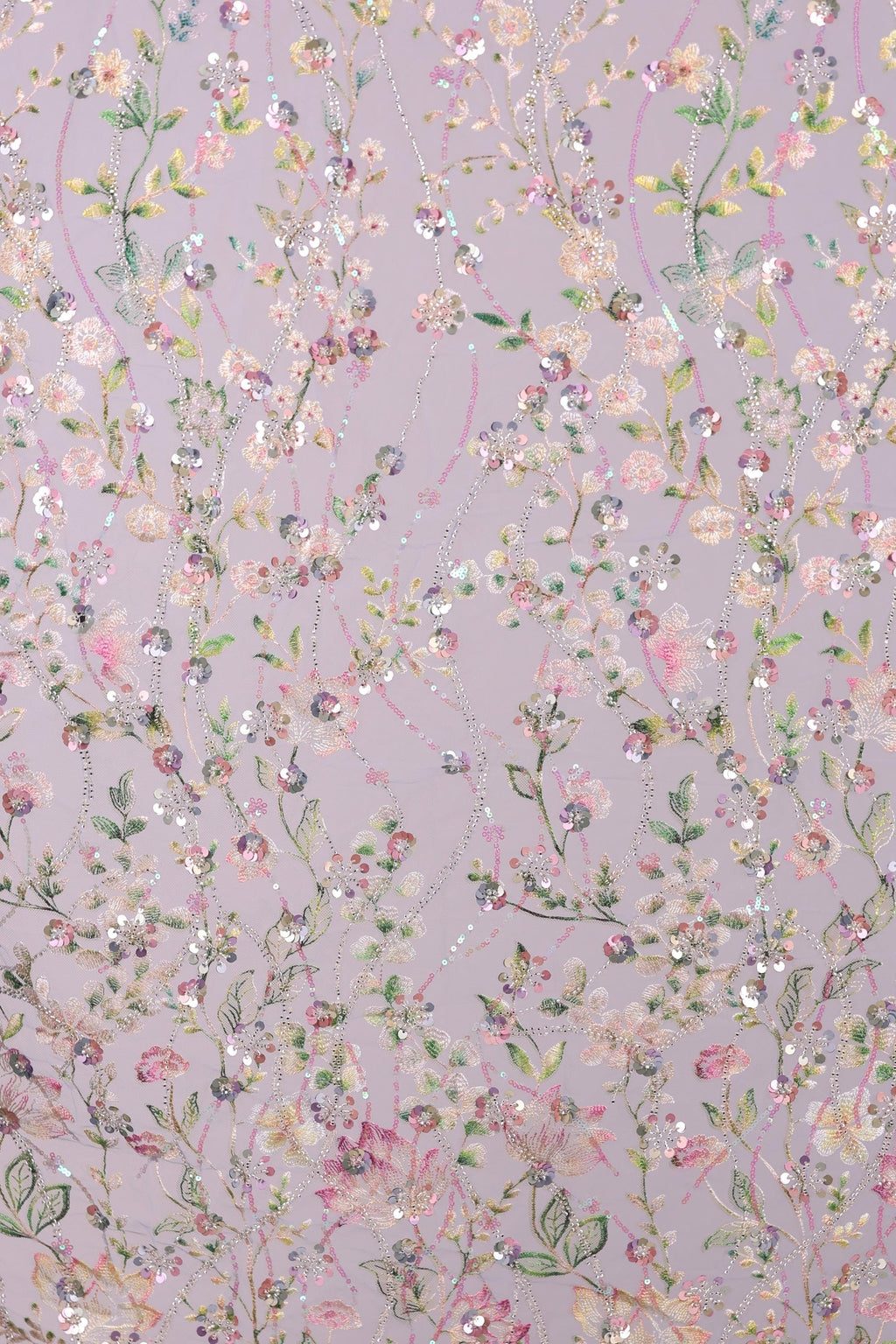 a vibrant and intricate floral pattern with various shades of pink, green, and yellow flowers and leaves. The pattern is composed of numerous small flowers and leaves, creating a visually striking and detailed design.