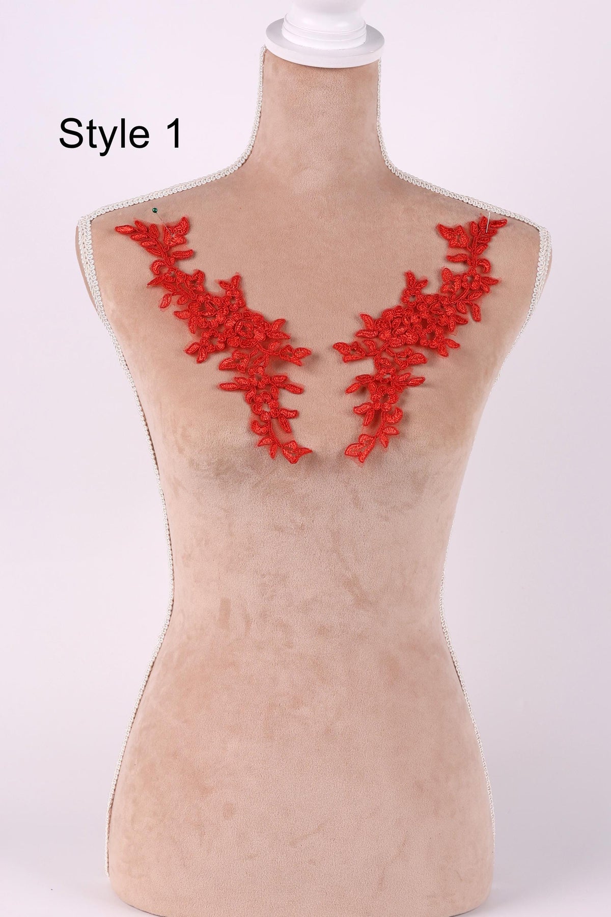 A mannequin with red embroidered flowers on the bust area, labeled as "Style 1".