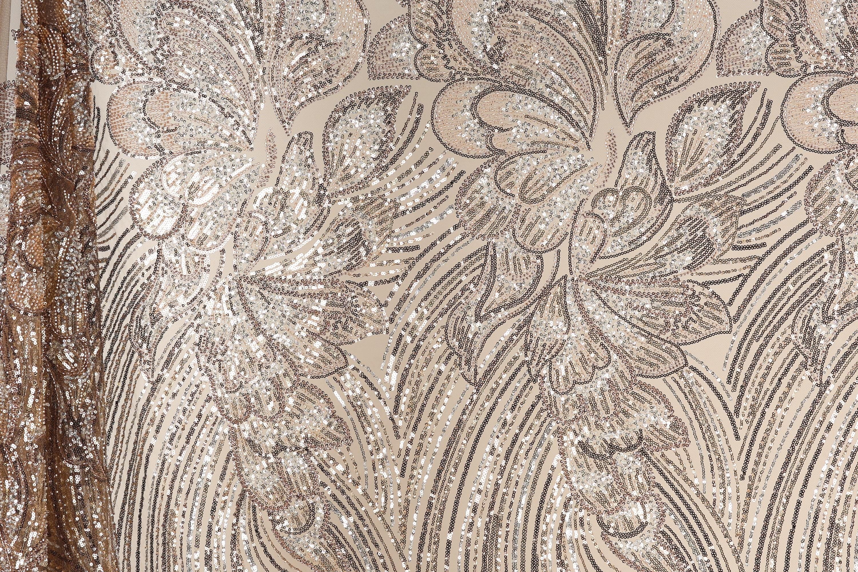 a close-up view of a fabric with a floral pattern, showcasing intricate details and textures.
