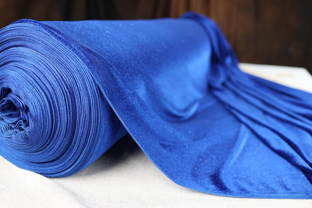 a close up of a blue tie on a table
