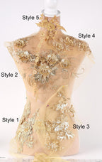 A mannequin with a beige dress adorned with intricate floral embroidery in various styles, including styles 5, 4, 2, 1, and 3.
