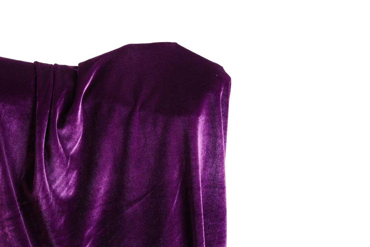 a close-up view of a shiny, purple velvet fabric.