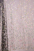 The image is a collage of various floral and leaf-like patterns, with a predominantly pink and white color scheme. The patterns appear to be intricately designed and detailed, creating a visually striking and harmonious composition.