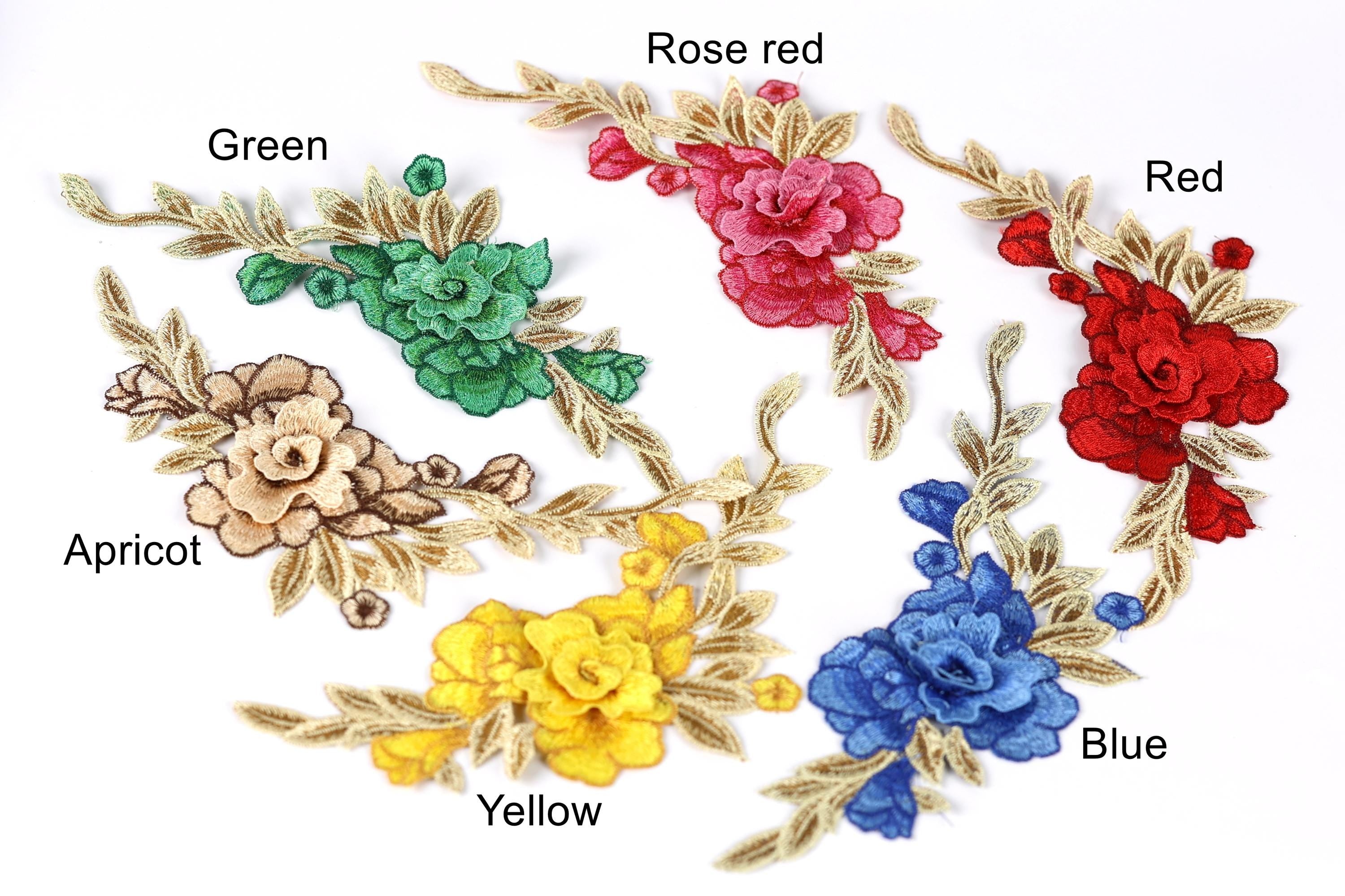 six different colored flowers, each with a unique color and leaf pattern, arranged in a circular pattern.