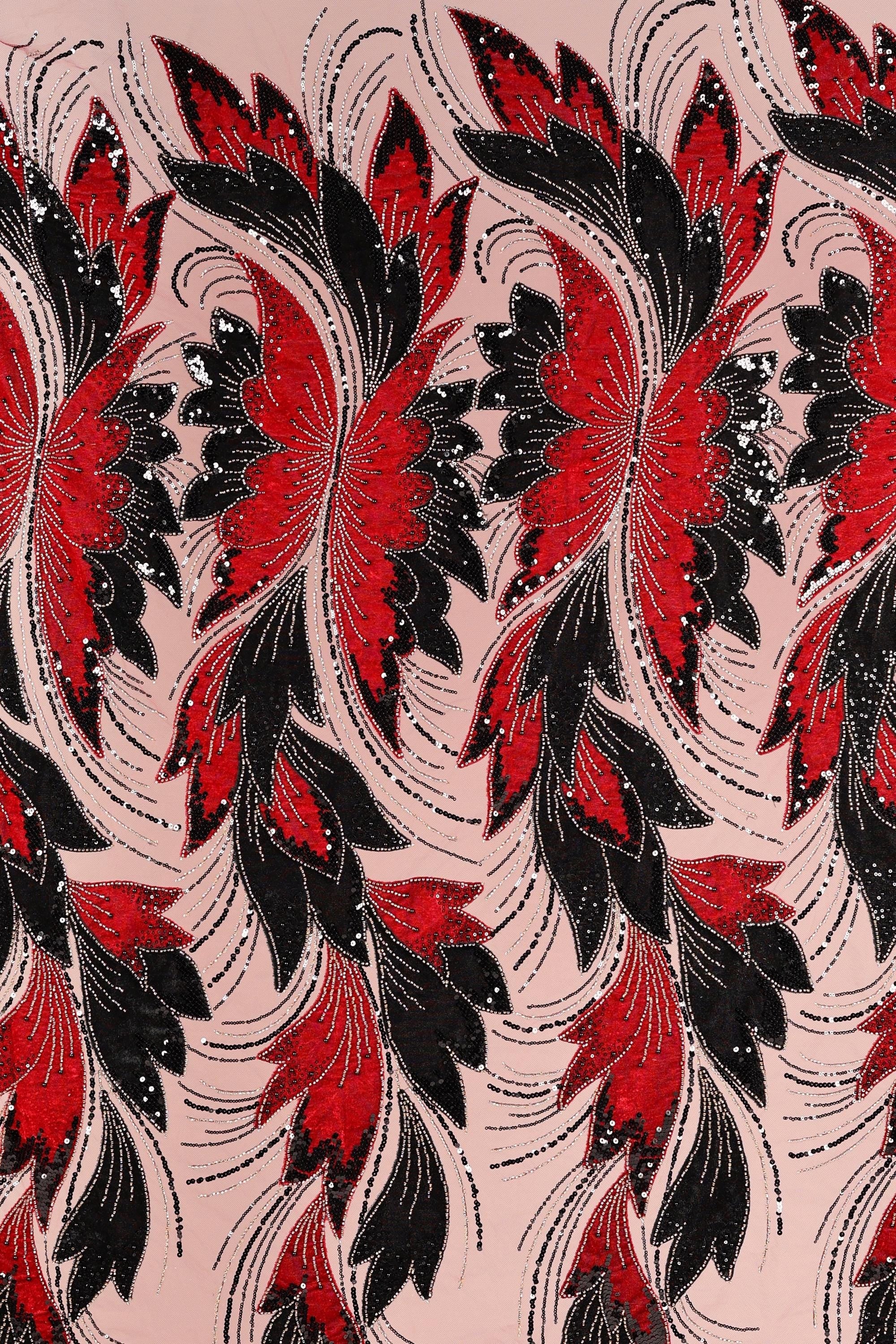 a repeating pattern of red and black flowers with long, flowing petals against a light pink background.