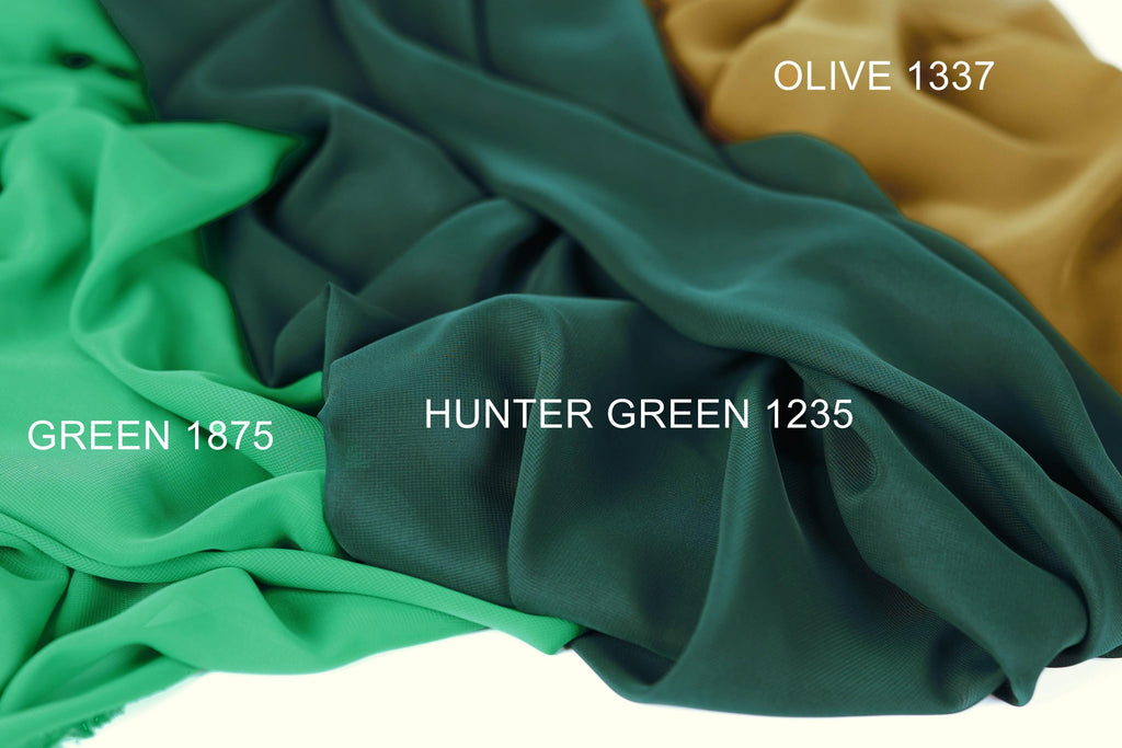 three different fabric swatches, each with a distinct color: green, olive green, and brown. The text labels the swatches with their respective colors and a reference number, "GREEN 1875", "OLIVE 1337", and "HUNTER GREEN 1235".