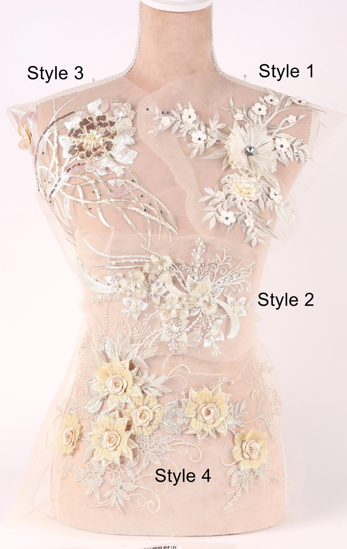 A mannequin with a white dress adorned with various floral and lace embellishments, including roses and leaves, displayed in different styles.