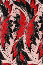 a repeating pattern of red and black butterfly-like shapes with intricate designs and sequins, creating a visually striking and vibrant textile or fabric design.