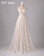 A beautiful, lace wedding dress with a long train and a sweetheart neckline, displayed on a mannequin.