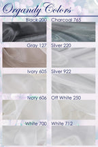 a bunch of different colors of fabric on a white background