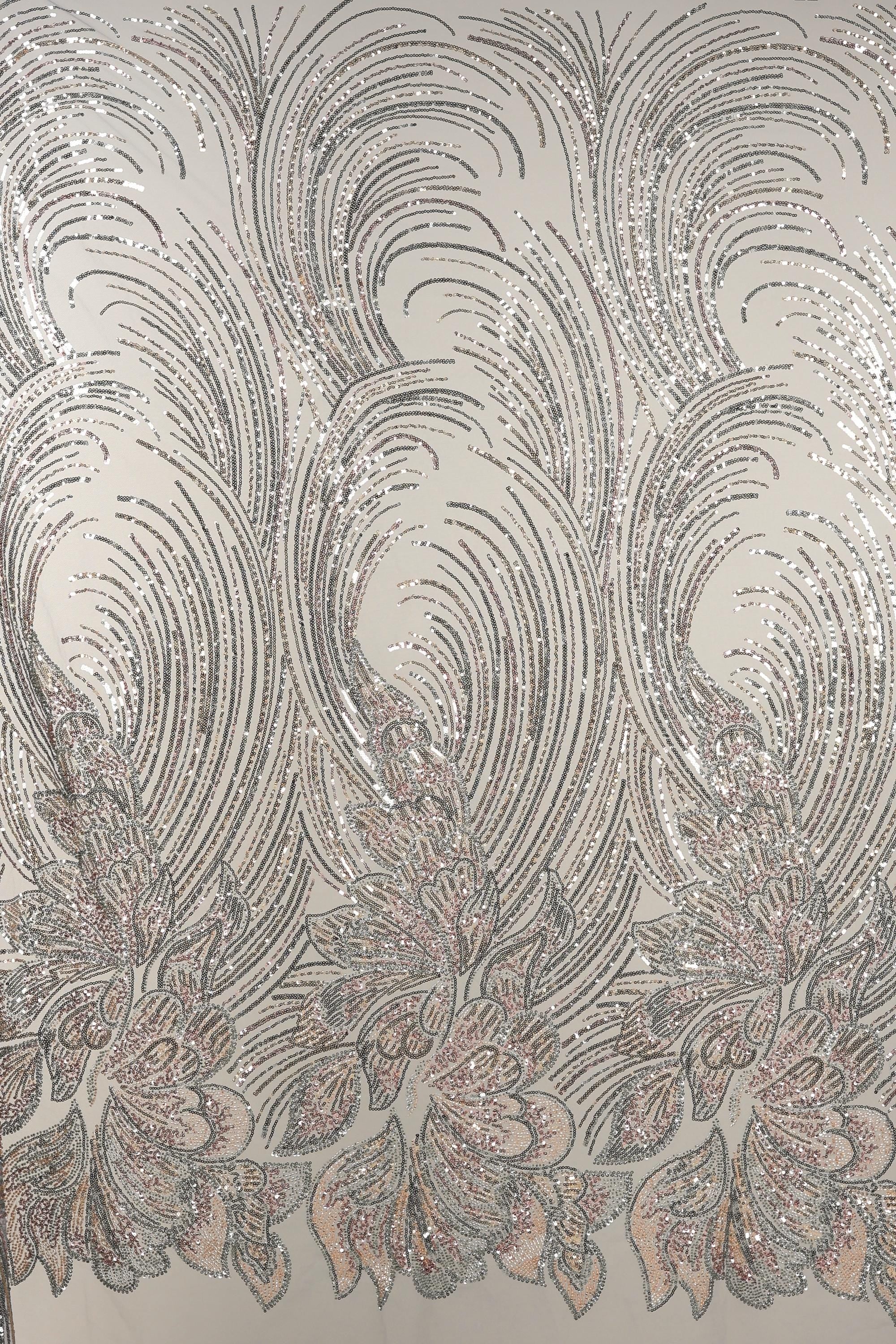 a repeating pattern of intricate, swirling lines and shapes in shades of gray and white, creating a visually striking and dynamic design.