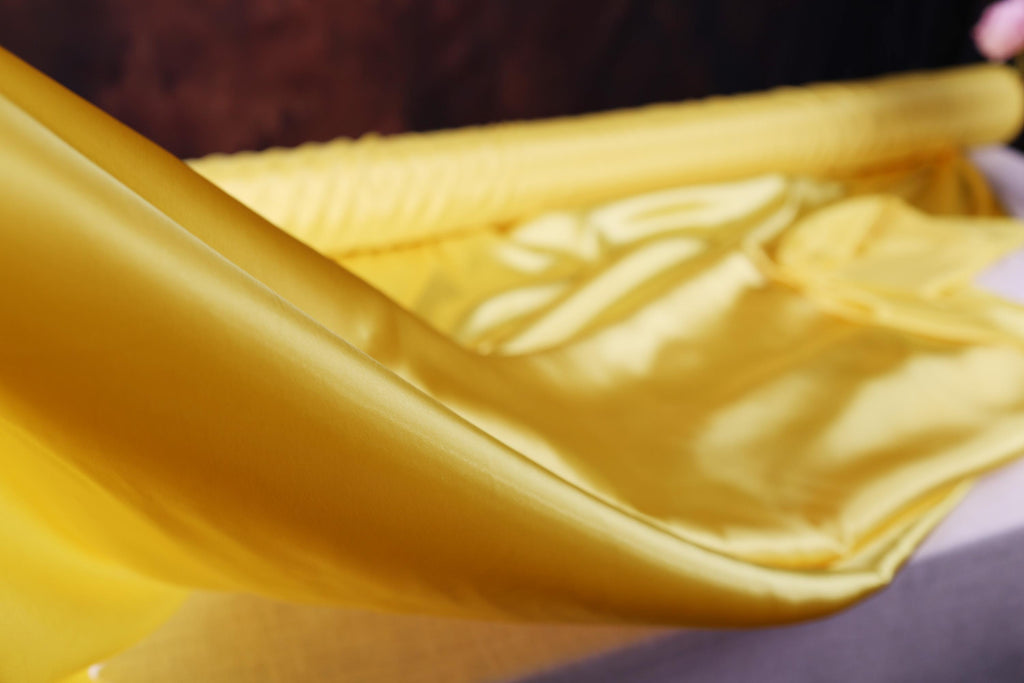 a close up of a yellow object on a table