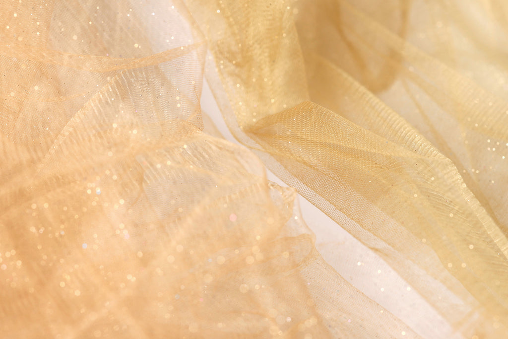 a close up view of a yellow fabric