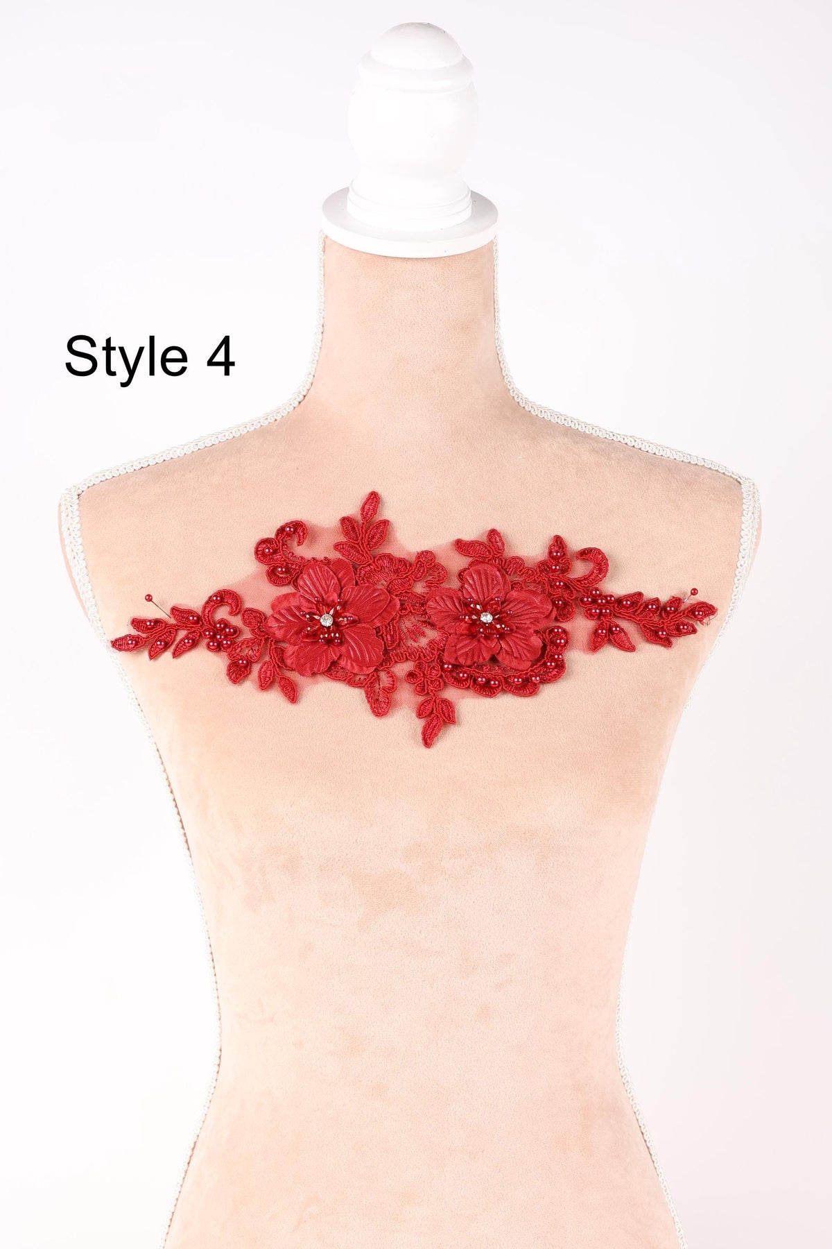 A mannequin with a red floral embroidered on its bust, labeled as "Style 4".