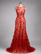 A red, floor-length dress with a sheer neckline and a long train, featuring a floral pattern on the bodice and skirt.