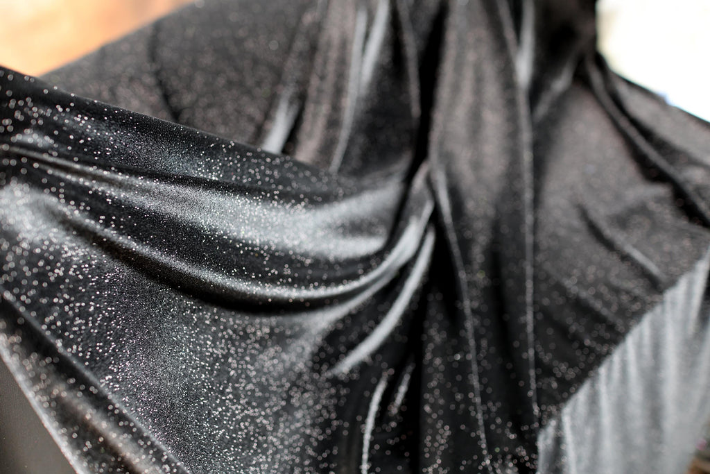 a close up of a black cloth on a table