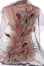 a dress with a vibrant and intricate design of colorful beads and sequins, creating a visually striking and eye-catching pattern.