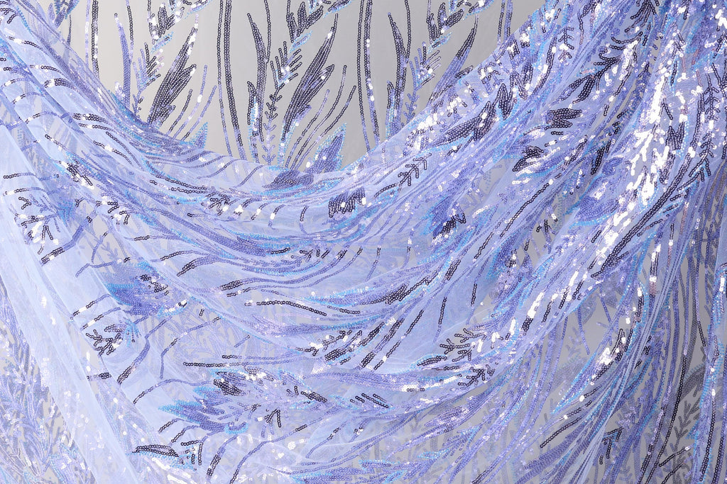a close-up view of a fabric with a floral pattern, showcasing the intricate details and textures of the material.