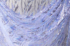 a close-up view of a fabric with a floral pattern, showcasing the intricate details and textures of the material.