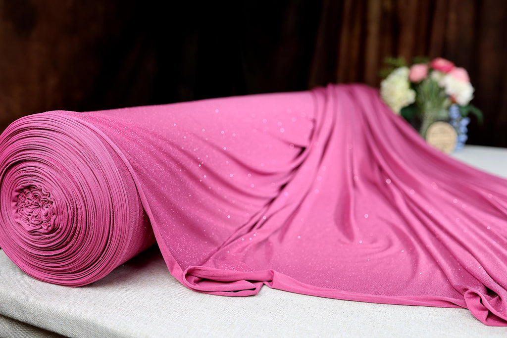 a close up of a pink cloth on a table
