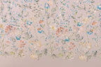 The image is a collage of various floral patterns and designs, featuring a variety of flowers and leaves in different colors and shapes. The patterns are intricately detailed and appear to be hand-stitched or embroidered, creating a visually appealing and vibrant display.
