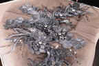 a close up of a piece of cloth with flowers on it