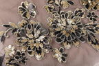 a close up of a piece of cloth with flowers on it