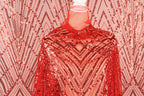 a mannequin wearing a red sequin dress with a geometric pattern.
