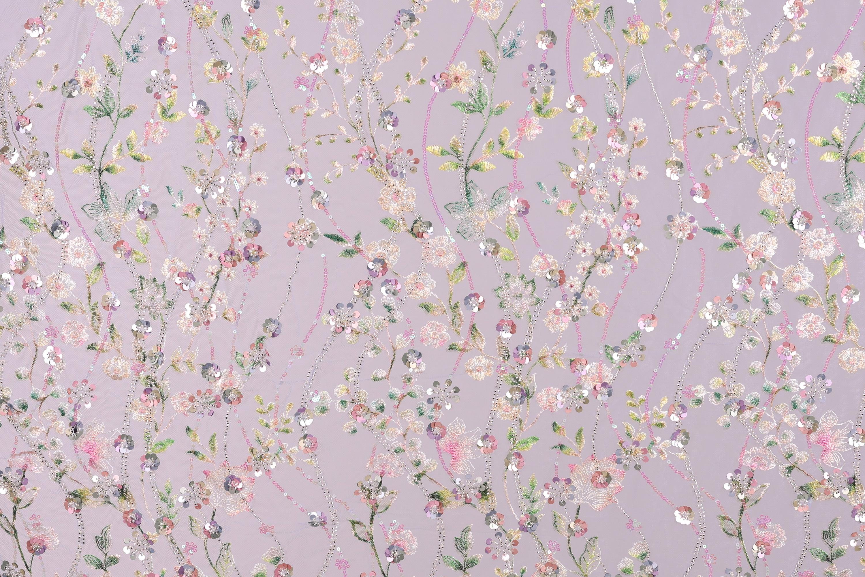 a vibrant and intricate floral pattern with various shades of pink, white, and green flowers and leaves. The pattern is composed of numerous small flowers and leaves, creating a visually striking and detailed design. The overall composition is visually engaging and captivating, with the colors and patterns creating a sense of depth and complexity.
