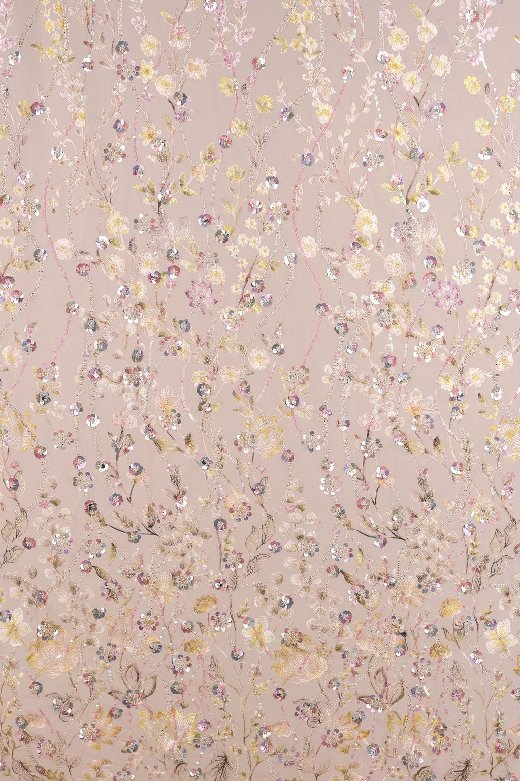 a repeating floral pattern with various shades of pink, yellow, and white flowers and leaves. The pattern is composed of numerous small flowers and leaves, creating a visually appealing and intricate design.