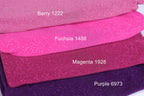 a close-up of three fabric swatches in different colors: pink, purple, and magenta. Each swatch has a label indicating the color and possibly a brand or product name.