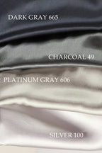 four different fabric swatches, each with a unique color and texture, arranged in a vertical line.