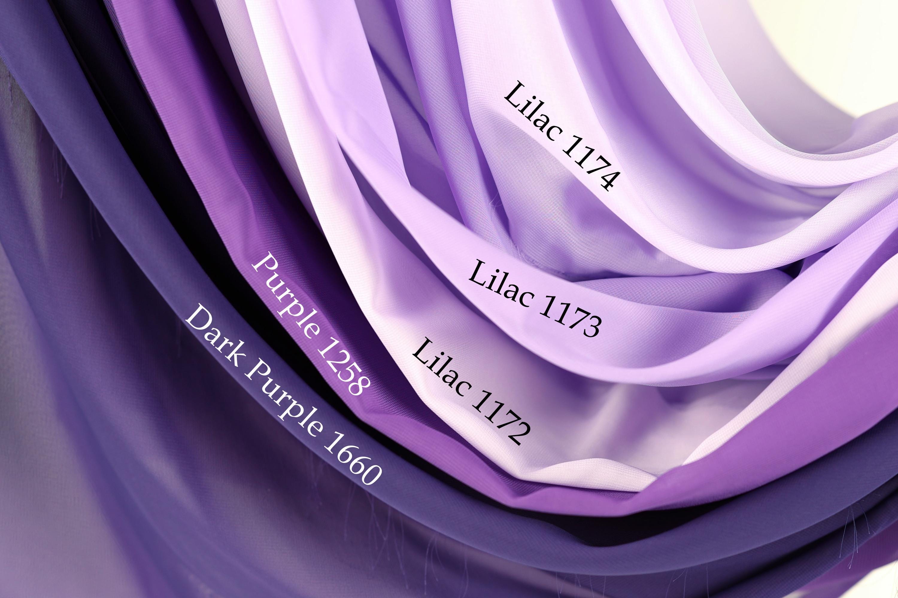 a collection of fabric swatches in various shades of purple, including dark purple, light purple, and lavender.
