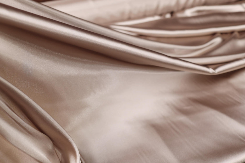 a close up view of a satin material