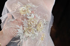 a close up of a person wearing a veil with flowers on it