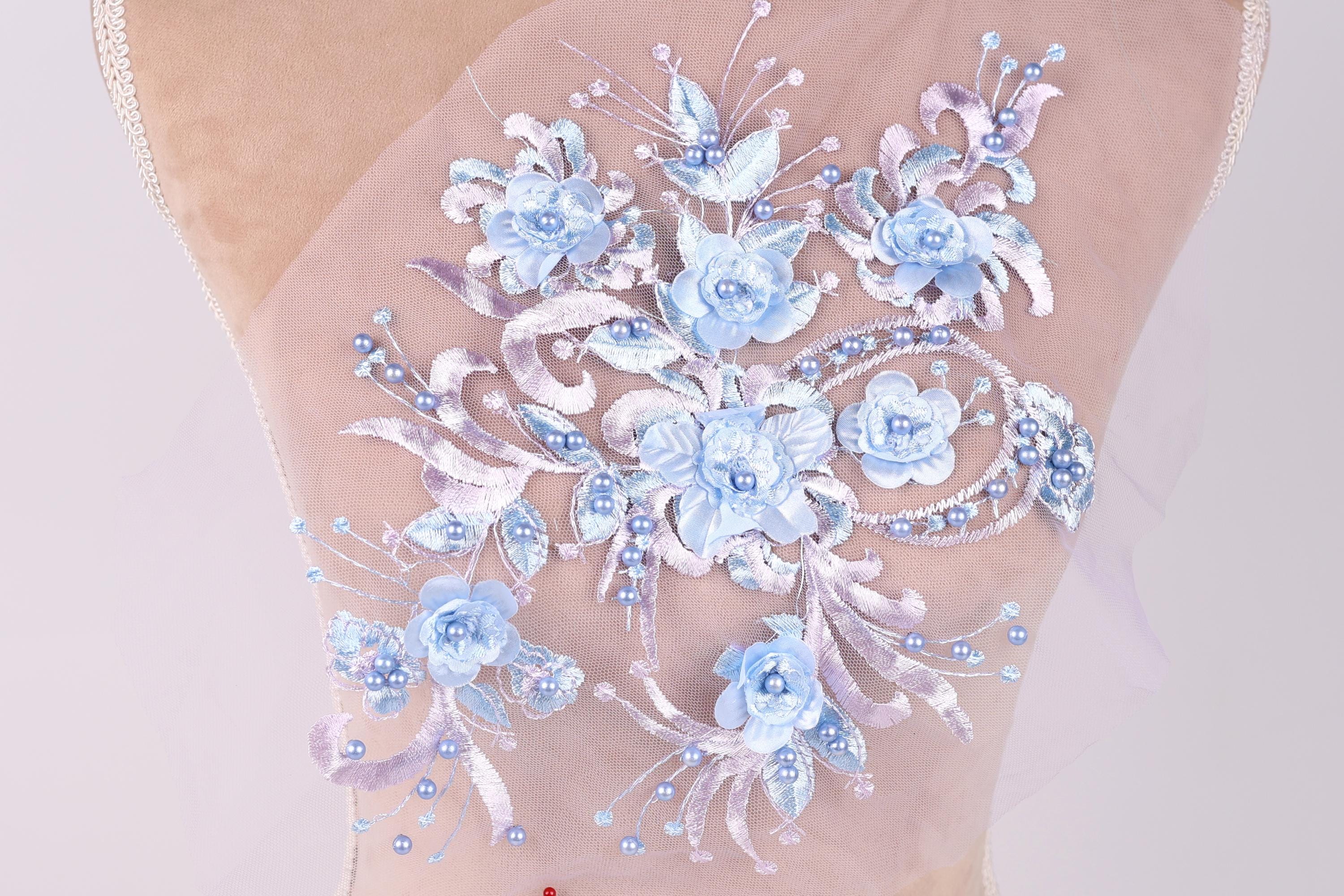 a close up of a dress on a mannequin