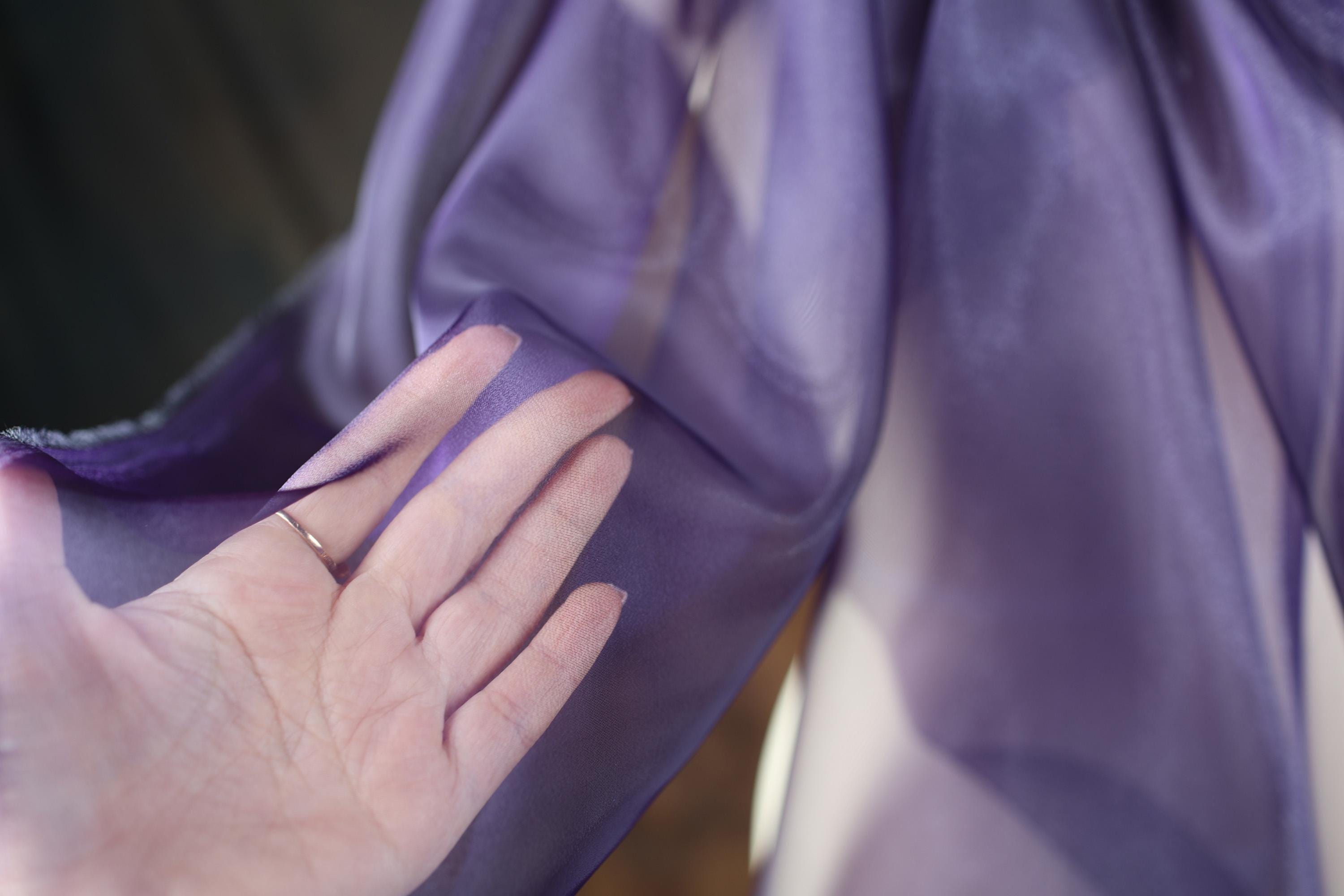 a woman's hand with a ring on it