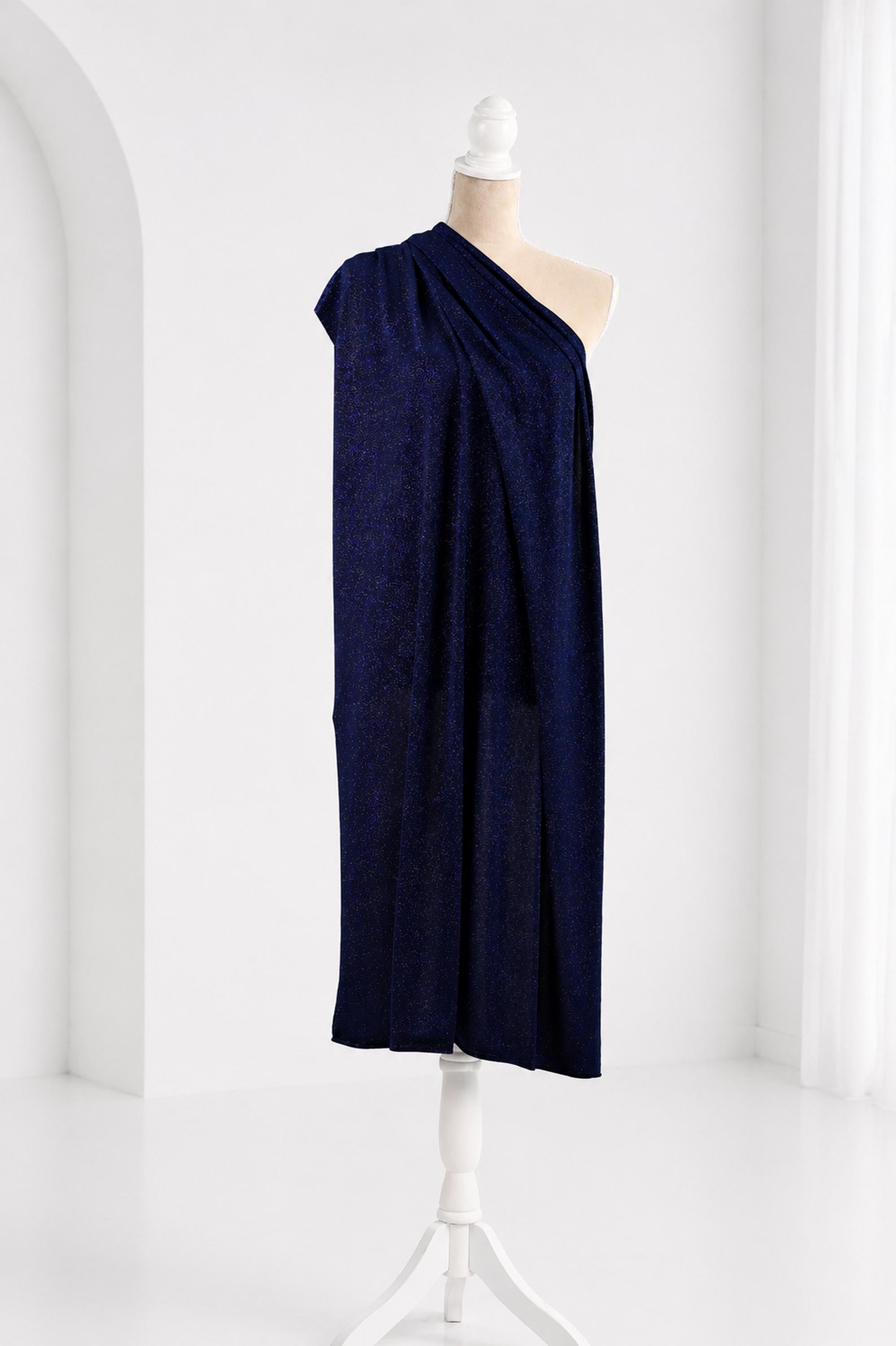 A navy blue one-shoulder dress displayed on a mannequin against a white background.