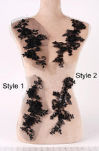 a mannequin with various black lace designs on its bust area, including floral and leaf-like patterns. The mannequin is positioned on a white background, and there are two styles of lace designs displayed on it, labeled as Style 1 and Style 2.
